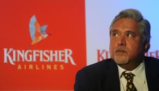 Chairman and CEO of India’s Kingfisher Airlines Vijay Mallya looks during a press conference in Mumbai on November 15, 2011. Kingfisher Airlines said it had doubled its losses in the July-September quarter, as its billionaire chief Vijay Mallya was set to announce plans to keep the Indian company afloat. AFP PHOTO/ Punit PARANJPE (Photo credit should read PUNIT PARANJPE/AFP/Getty Images)
